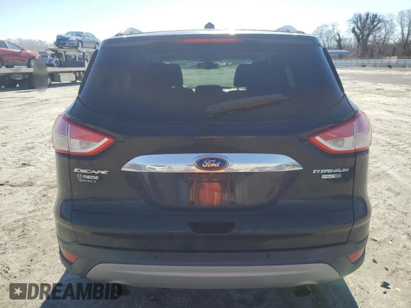 2014 Ford Escape Titanium with VIN 1FMCU9J9XEUC86597, listed as a Copart auction lot 45321355 with 142,278 mi miles and Salvage Title. Bid and sale history available at carsss.com. Image 6.
