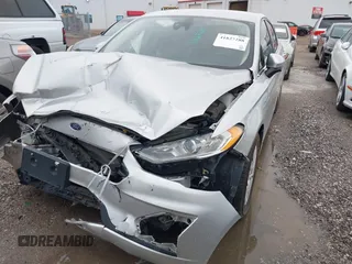 2019 Ford Fusion S with VIN 3FA6P0G71KR275393, listed as a IAAI auction lot 41827288 with 108,160 mi miles and . Bid and sale history available at DreamBid. Image 2.