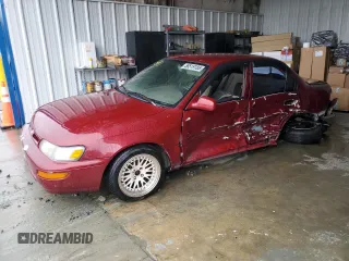 1997 Toyota Corolla with VIN 1NXBA02EXVZ622454, listed as a Copart auction lot 58519185 with 376,526 mi miles and Salvage title. Bid and sale history available at DreamBid. Image 1.