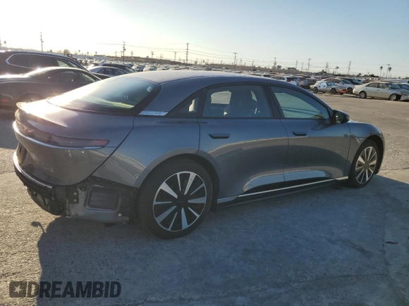 2023 Lucid Air Pure z VIN 50EA1PFA0PA006410, wystawiony jako Copart lot #89054185 z przebiegiem 13 605 mil mil oraz Szkody całkowita. Historia ofert i sprzedaży dostępna na DreamBid. Obrazek 3.
