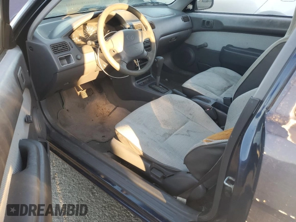 1996 Toyota Tercel DX z VIN JT2AC52L5T0190097, wystawiony jako Copart lot #76574844 z przebiegiem 175 256 mil mil oraz Tytuł czysty. Historia ofert i sprzedaży dostępna na DreamBid. Obrazek 8.