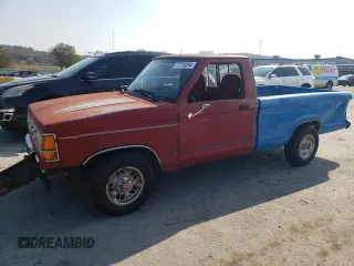 1989 Ford Ranger Splash with VIN 1FTCR10A2KUB58322, listed as a Copart auction lot 77710394 with 890,534 mi miles and Salvage Title. Bid and sale history available at DreamBid. Image 1.