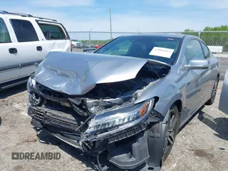 2016 Honda Accord Touring with VIN 1HGCT2B03GA000691, listed as a IAAI auction lot 42009414 with 70,306 mi miles and . Bid and sale history available at DreamBid. Image 2.