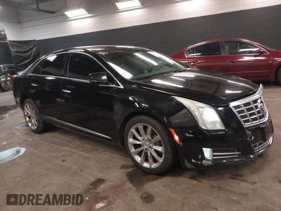 2013 Cadillac XTS Luxury z VIN 2G61R5S34D9102625, wystawiony jako IAAI lot #41668752 z przebiegiem 112 065 mil mil oraz . Historia ofert i sprzedaży dostępna na DreamBid. Obrazek 1.