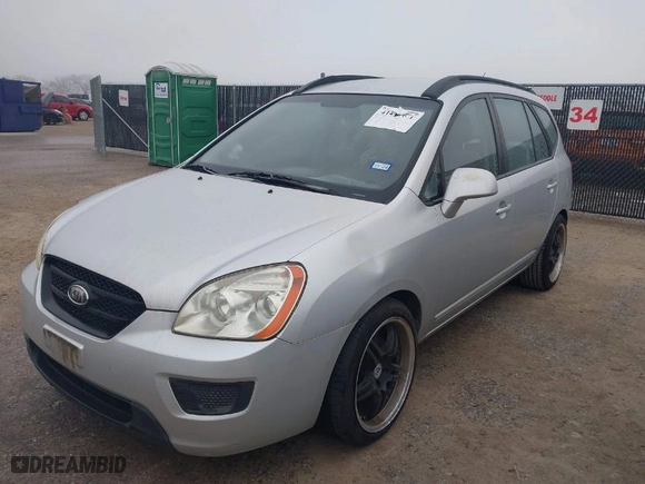 2008 Kia Rondo EX with VIN KNAFG526487135597, listed as a IAAI auction lot 41497631 with 202,426 mi miles. Bid and sale history available at carsss.com. Image 6.