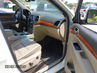 2011 Jeep Grand Cherokee Overland with VIN 1J4RR6GG3BC587857, listed as a IAAI auction lot 42879845 with 165,572 mi miles and . Bid and sale history available at DreamBid. Image 5.