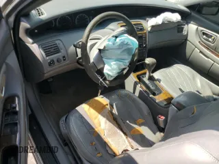 2000 Toyota Avalon XL with VIN 4T1BF28B4YU059562, listed as a Copart auction lot 58356285 with Not provided miles and Salvage title. Bid and sale history available at DreamBid. Image 8.