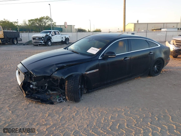 2018 Jaguar XJ with VIN SAJWJ2GD3J8W15092, listed as a IAAI auction lot 41844106 with 56,357 mi miles. Bid and sale history available at carsss.com. Image 2.