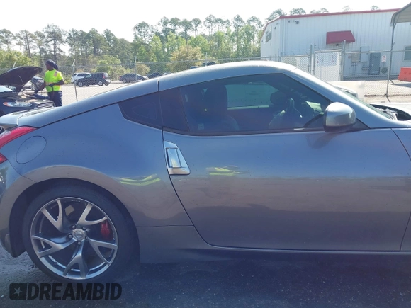 2013 Nissan 370Z with VIN JN1AZ4EH1DM880983, listed as a IAAI auction lot 41937876 with 130,613 mi miles. Bid and sale history available at carsss.com. Image 13.