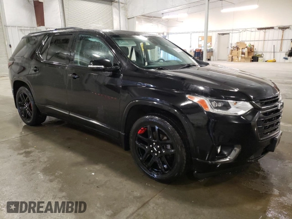 2018 Chevrolet Traverse Premier with VIN 1GNEVJKWXJJ119546, listed as a Copart auction lot 52326795 with 111,836 mi miles and Salvage Title. Bid and sale history available at carsss.com. Image 4.