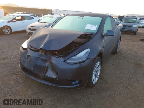 2021 Tesla Model Y Standard Range z VIN 5YJYGDED4MF121963, wystawiony jako IAAI lot #41490477 z przebiegiem 41 941 mil mil oraz . Historia ofert i sprzedaży dostępna na DreamBid. Obrazek 19.
