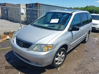 2000 Mazda MPV DX with VIN JM3LW28G8Y0125047, listed as a IAAI auction lot 42305890 with 214,647 mi miles and . Bid and sale history available at DreamBid. Image 2.