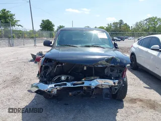 2004 GMC Sierra 1500 SLE with VIN 2GTEC19T941307337, listed as a IAAI auction lot 42092692 with 187,756 mi miles and . Bid and sale history available at DreamBid. Image 13.