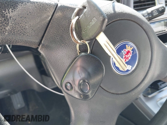 2005 Saab 9-2X Linear z VIN JF4GG616X5H052592, wystawiony jako IAAI lot #42010459 z przebiegiem 94 512 mil mil oraz . Historia ofert i sprzedaży dostępna na DreamBid. Obrazek 11.