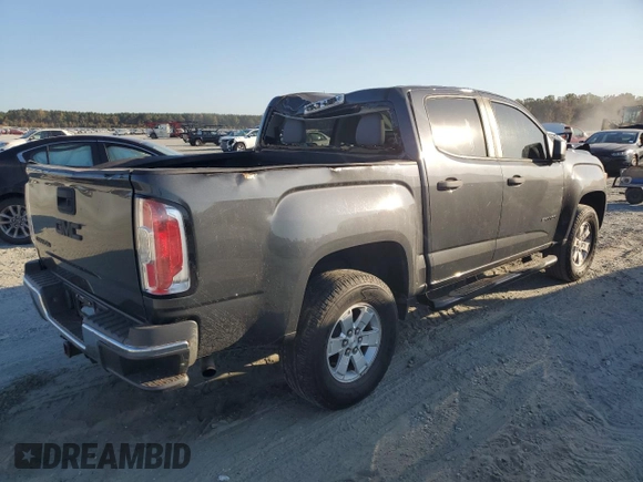 2017 GMC Canyon 2WD with VIN 1GTG5BEA7H1227043, listed as a Copart auction lot 77062374 with 101,338 mi miles and Salvage Title. Bid and sale history available at carsss.com. Image 3.