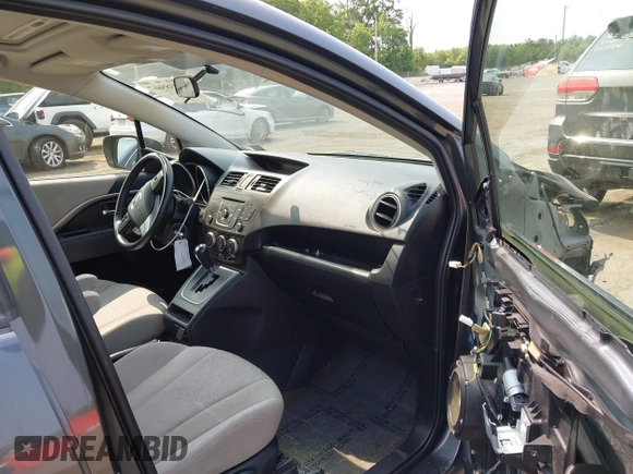 2012 Mazda 5 Touring z VIN JM1CW2CL5C0126744, wystawiony jako IAAI lot #42385667 z przebiegiem 140 150 mil mil oraz . Historia ofert i sprzedaży dostępna na DreamBid. Obrazek 5.