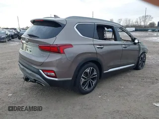 2019 Hyundai Santa Fe Ultimate with VIN 5NMS5CAA6KH035552, listed as a IAAI auction lot 41540230 with Not Provided miles and . Bid and sale history available at DreamBid. Image 4.