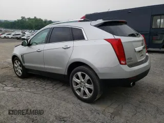 2015 Cadillac SRX Performance Collection with VIN 3GYFNFE36FS549358, listed as a Copart auction lot 59724065 with 132,045 mi miles and Salvage title. Bid and sale history available at DreamBid. Image 2.