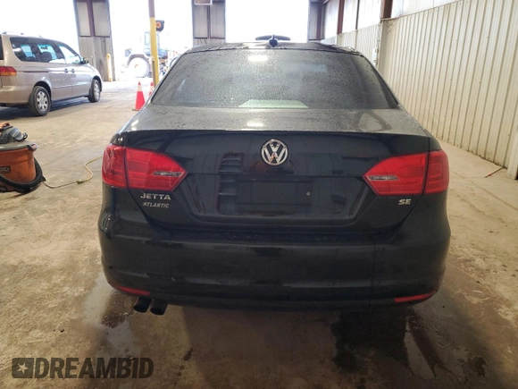 2014 Volkswagen Jetta SE with VIN 3VWD17AJ6EM387167, listed as a Copart auction lot 52251955 with 150,441 mi miles and Salvage title. Bid and sale history available at DreamBid. Image 6.