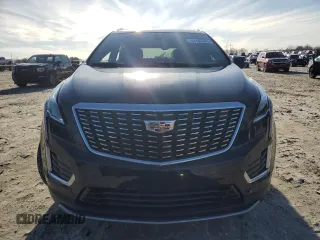 2023 Cadillac XT5 FWD Premium Luxury with VIN 1GYKNCR48PZ132957, listed as a Copart auction lot 42132845 with 27,312 mi miles and Salvage Title. Bid and sale history available at carsss.com. Image 5.