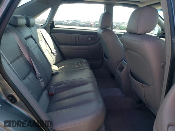 2001 Toyota Avalon XL z VIN 4T1BF28B51U184110, wystawiony jako Copart lot #52398285 z przebiegiem 127 179 mil mil oraz Szkoda całkowita • Salvage title. Historia ofert i sprzedaży dostępna na DreamBid. Obrazek 10.