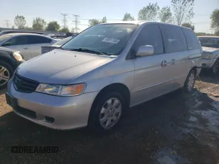 2004 Honda Odyssey EX-L z VIN 5FNRL18084B078820, wystawiony jako Copart lot #69801154 z przebiegiem 220 036 mil mil oraz Szkoda całkowita • Salvage title. Historia ofert i sprzedaży dostępna na DreamBid. Obrazek 1.
