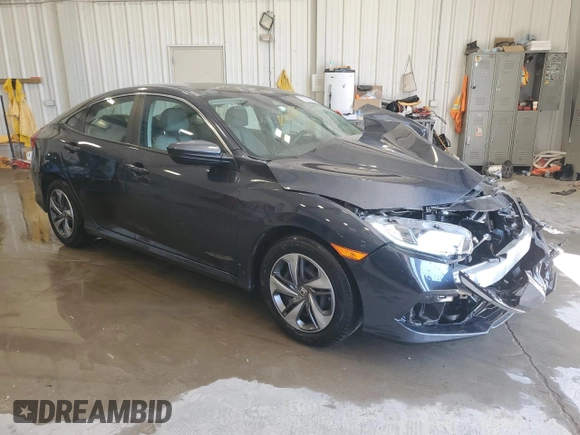 2021 Honda Civic LX z VIN 2HGFC2F60MH502941, wystawiony jako Copart lot #56029145 z przebiegiem 52 290 mil mil oraz Nie do naprawy • Non repairable. Historia ofert i sprzedaży dostępna na DreamBid. Obrazek 4.