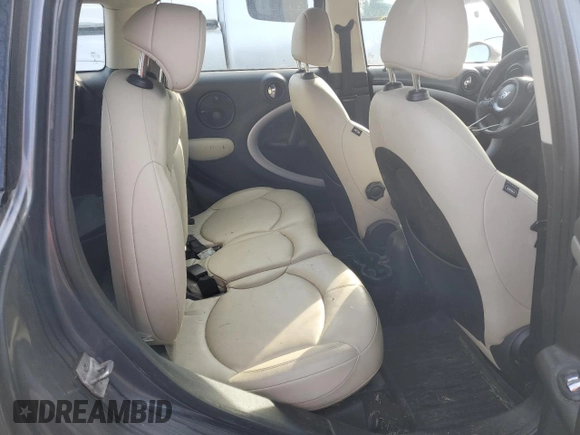 2016 MINI Countryman S z VIN WMWZC5C52GWP49650, wystawiony jako Copart lot #49153185 z przebiegiem 166 695 mil mil oraz Szkody całkowita. Historia ofert i sprzedaży dostępna na DreamBid. Obrazek 10.