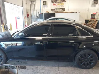 2015 Audi A4 Premium with VIN WAUBFAFL2FN044377, listed as a IAAI auction lot 41230721 with 144,942 mi miles. Bid and sale history available at carsss.com. Image 14.