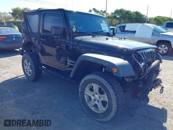 2016 Jeep Wrangler Willys Wheeler z VIN 1C4AJWAG9GL257621, wystawiony jako IAAI lot #41432306 z przebiegiem 84 248 mil mil oraz . Historia ofert i sprzedaży dostępna na DreamBid. Obrazek 1.