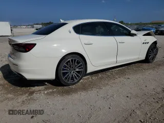 2022 Maserati Quattroporte GT z VIN ZAM56XPA8N1391441, wystawiony jako Copart lot #52809735 z przebiegiem 26 405 mil mil oraz Szkoda całkowita • Salvage title. Historia ofert i sprzedaży dostępna na DreamBid. Obrazek 3.