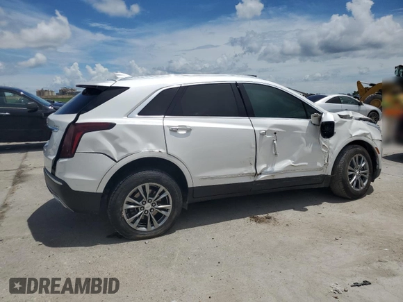 2021 Cadillac XT5 FWD Premium Luxury z VIN 1GYKNCR44MZ106982, wystawiony jako Copart lot #62234455 z przebiegiem 93 079 mil mil oraz Szkoda całkowita • Salvage title. Historia ofert i sprzedaży dostępna na DreamBid. Obrazek 3.
