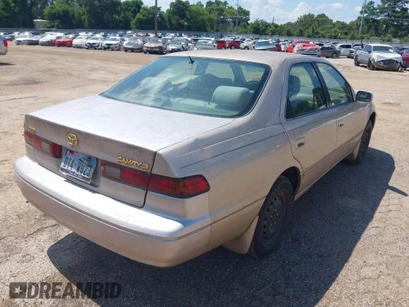 1997 Toyota Camry LE with VIN JT2BG22K4V0084080, listed as a IAAI auction lot 42566043 with 167,774 mi miles and . Bid and sale history available at DreamBid. Image 4.