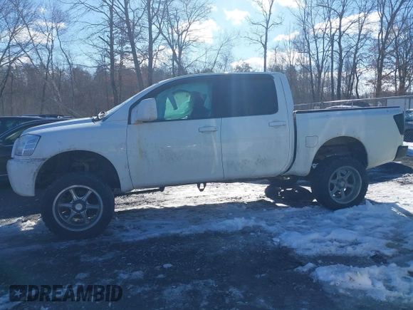 2012 Nissan Titan SV with VIN 1N6BA0EJ0CN309933, listed as a IAAI auction lot 41472091 with 147,635 mi miles. Bid and sale history available at carsss.com. Image 14.
