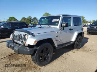 2012 Jeep Wrangler Sahara z VIN 1C4AJWBG4CL153997, wystawiony jako Copart lot #55985305 z przebiegiem 256 157 mil mil oraz Szkoda całkowita • Salvage title. Historia ofert i sprzedaży dostępna na DreamBid. Obrazek 1.