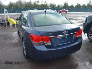 2014 Chevrolet Cruze LS z VIN 1G1PA5SH1E7189504, wystawiony jako IAAI lot #41143671 z przebiegiem 159 775 mil mil oraz . Historia ofert i sprzedaży dostępna na DreamBid. Obrazek 3.