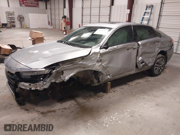 2018 Honda Accord Touring z VIN 1HGCV3F94JA001591, wystawiony jako IAAI lot #42161624 z przebiegiem 100 591 mil mil oraz . Historia ofert i sprzedaży dostępna na DreamBid. Obrazek 2.