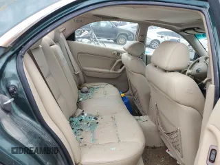 2001 Mazda Millenia z VIN JM1TA221011708952, wystawiony jako Copart lot #64995014 z przebiegiem Nie podano mil oraz Szkody całkowita. Historia ofert i sprzedaży dostępna na DreamBid. Obrazek 10.