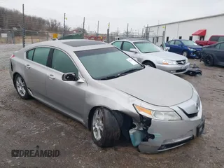 2009 Acura TL Tech with VIN 19UUA86569A020715, listed as a IAAI auction lot 41521211 with 179,977 mi miles. Bid and sale history available at carsss.com. Image 1.