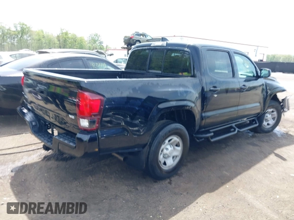2022 Toyota Tacoma SR with VIN 3TYCZ5AN0NT074683, listed as a IAAI auction lot 42117875 with 51,112 mi miles and . Bid and sale history available at DreamBid. Image 4.