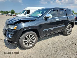 2017 Jeep Grand Cherokee Overland z VIN 1C4RJFCG4HC818132, wystawiony jako Copart lot #62642775 z przebiegiem 116 815 mil mil oraz Szkoda całkowita • Salvage title. Historia ofert i sprzedaży dostępna na DreamBid. Obrazek 1.