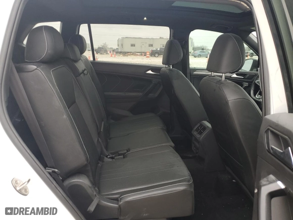 2022 Volkswagen Tiguan SE R-Line Black with VIN 3VVCB7AX0NM169257, listed as a Copart auction lot 43129745 with 59,517 mi miles and Salvage Title. Bid and sale history available at carsss.com. Image 11.