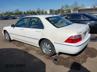 2003 Acura RL w/Navigation System with VIN JH4KA96693C000456, listed as a IAAI auction lot 41993013 with 190,892 mi miles. Bid and sale history available at carsss.com. Image 3.
