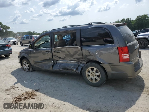 2010 Chrysler Town & Country Touring Plus with VIN 2A4RR8DX8AR382153, listed as a Copart auction lot 56470045 with 272,459 mi miles and Salvage Title. Bid and sale history available at DreamBid. Image 2.