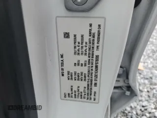 2021 Tesla Model 3 Standard Range Plus z VIN 5YJ3E1EA8MF978095, wystawiony jako Copart lot #45689495 z przebiegiem 44 375 mil mil oraz Szkody całkowita. Historia ofert i sprzedaży dostępna na DreamBid. Obrazek 13.