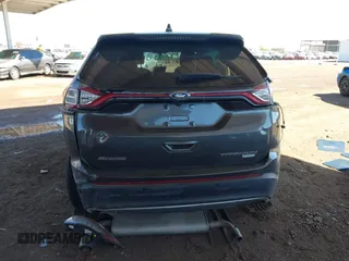 2015 Ford Edge Titanium z VIN 2FMTK3K90FBC12582, wystawiony jako IAAI lot #41860973 z przebiegiem Nie podano mil oraz . Historia ofert i sprzedaży dostępna na DreamBid. Obrazek 6.