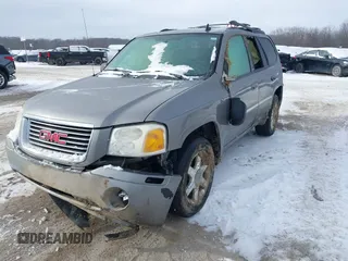 2007 GMC Envoy SLE with VIN 1GKDT13S072246688, listed as a IAAI auction lot 41258265 with 218,001 mi miles. Bid and sale history available at carsss.com. Image 6.