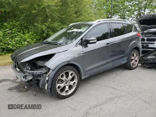2015 Ford Escape Titanium z VIN 1FMCU9J93FUA67563, wystawiony jako Copart lot #61770085 z przebiegiem 134 201 mil mil oraz Szkoda całkowita • Salvage title. Historia ofert i sprzedaży dostępna na DreamBid. Obrazek 1.