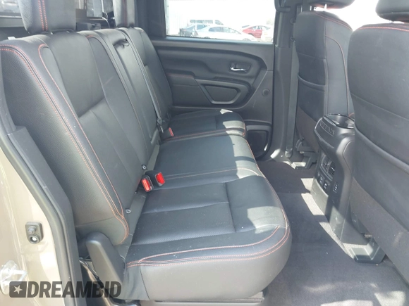 2021 Nissan Titan Pro-4X with VIN 1N6AA1ED4MN531369, listed as a IAAI auction lot 40597122 with 32,161 mi miles and . Bid and sale history available at DreamBid. Image 8.
