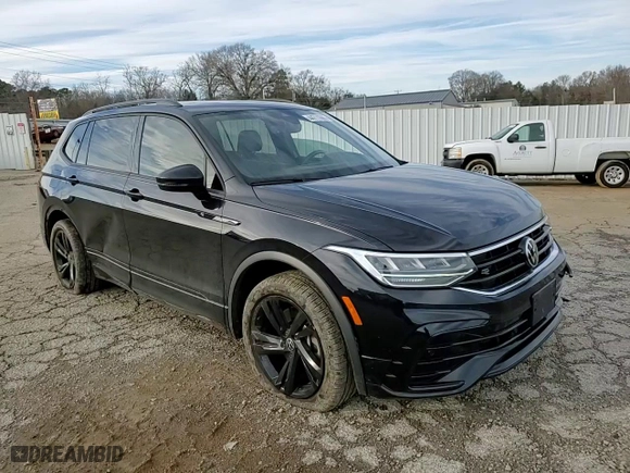 2023 Volkswagen Tiguan SE R-Line Black with VIN 3VVCB7AX9PM131559, listed as a Copart auction lot 44711665 with 28,166 mi miles and Salvage Title. Bid and sale history available at carsss.com. Image 11.